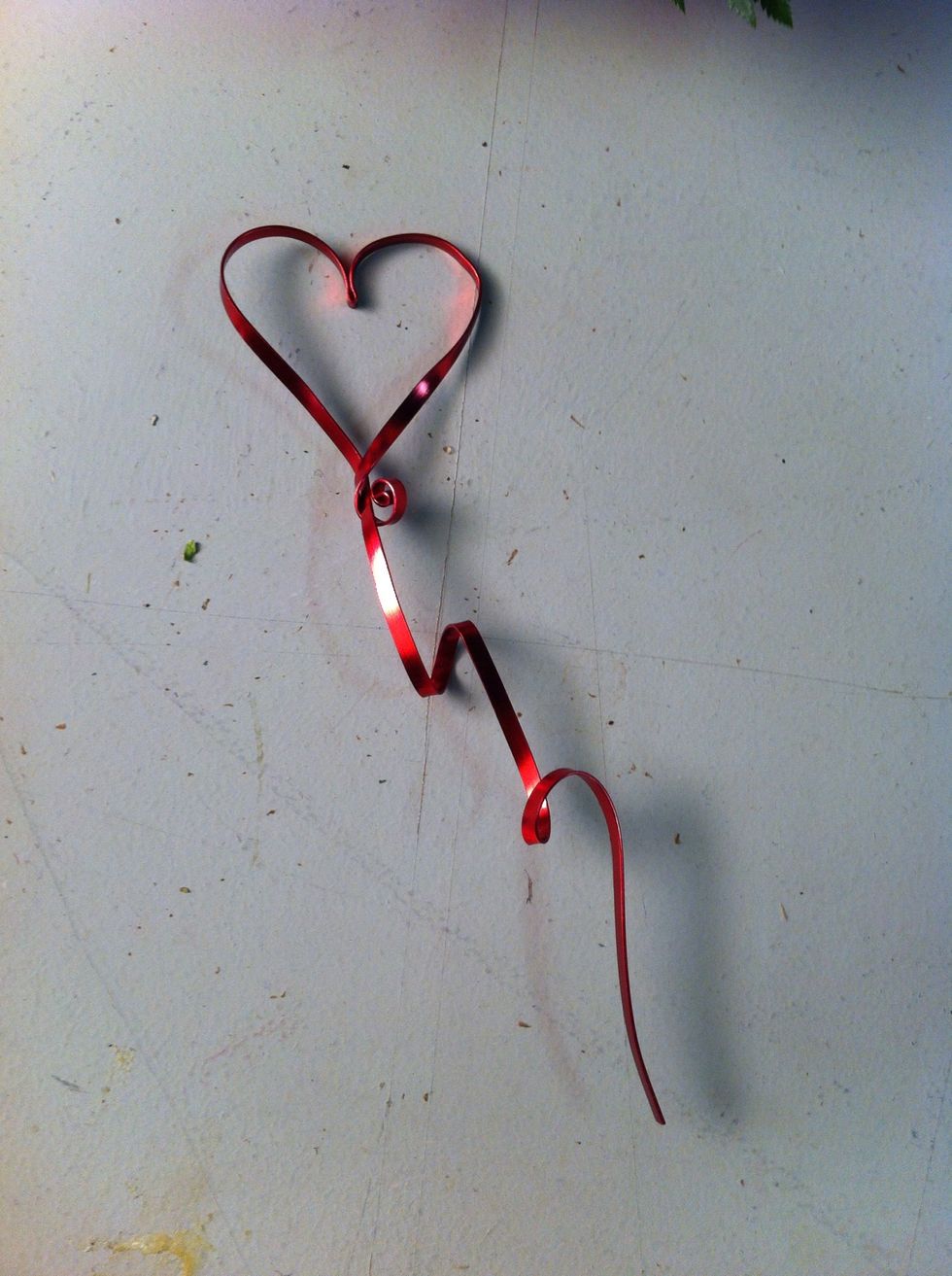 Form heart shapes with flat wire.