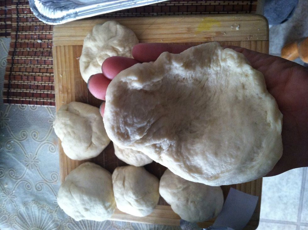 Form into balls. Take one ball, flatten, and place into the palm of your hand