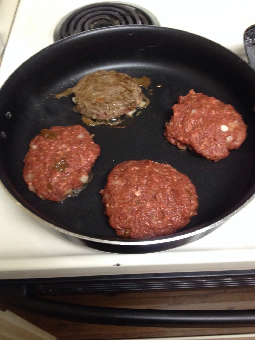 Form meat into patties and dry on low. You can fry your hamburgers all the way through. However, I decided to fry the top of each side then broil on 450 in the oven.
