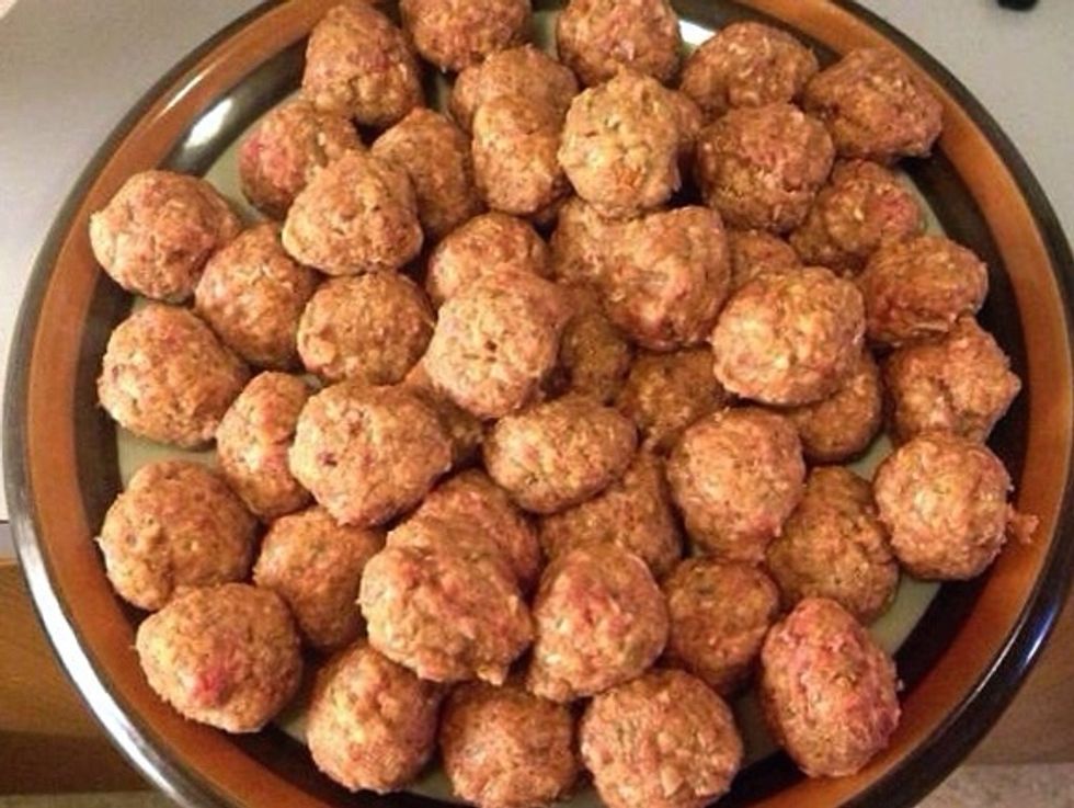 Form meatballs and put on a tray or a plate.
