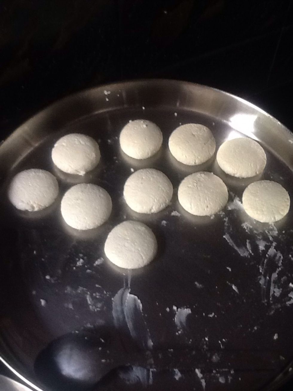 Form smooth balls of chenna and press them a little like I did. You can make larger but remember the size will double after cooking.