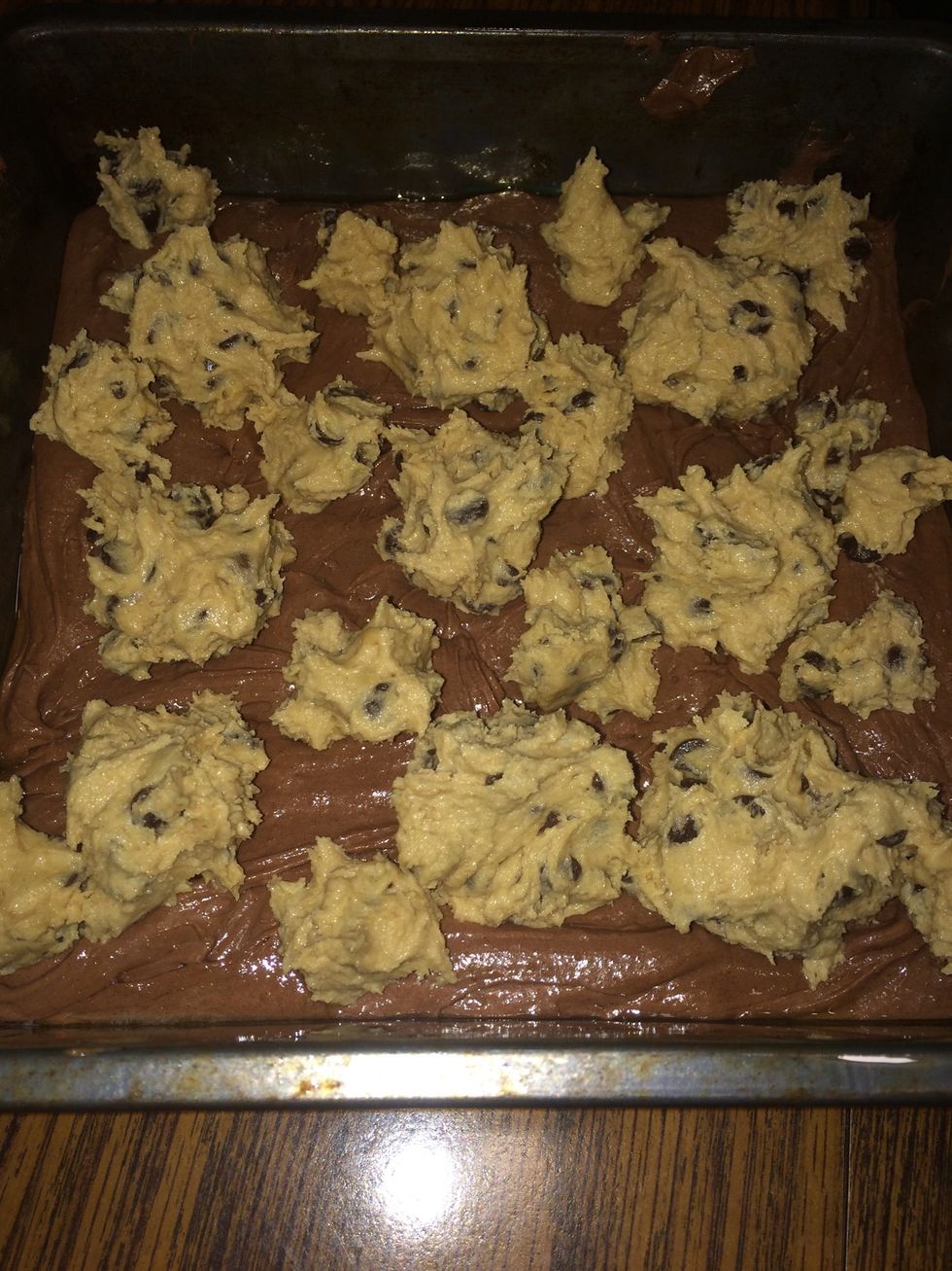 Form the cookie dough into small balls to place all over the brownie batter.