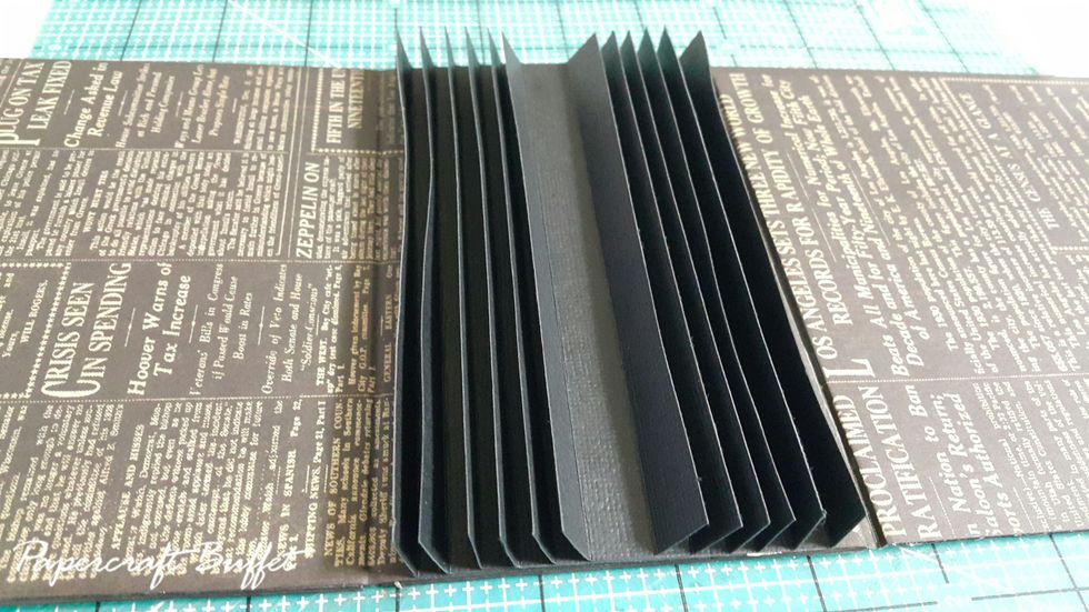 Form the layers and adhere on the album.