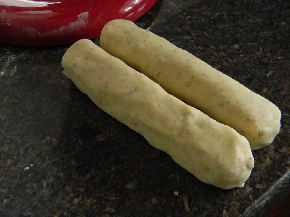 Form them into rolls by squishing the dough with both your hands. No rolling here or the dough will just fall apart. Also try to make sure that both ends are somewhat flat.