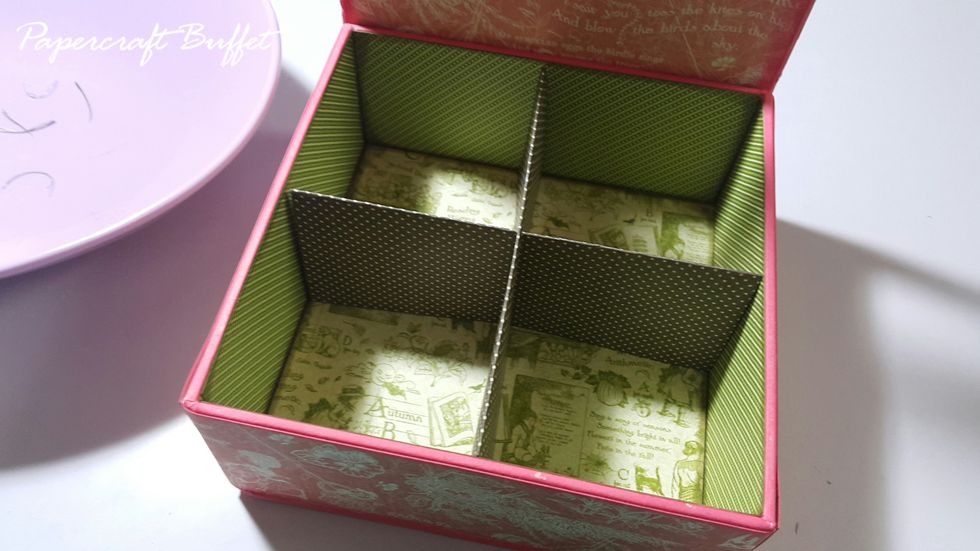 Form them to be the divider of the box storage, and adhere to the base of the box if you like.