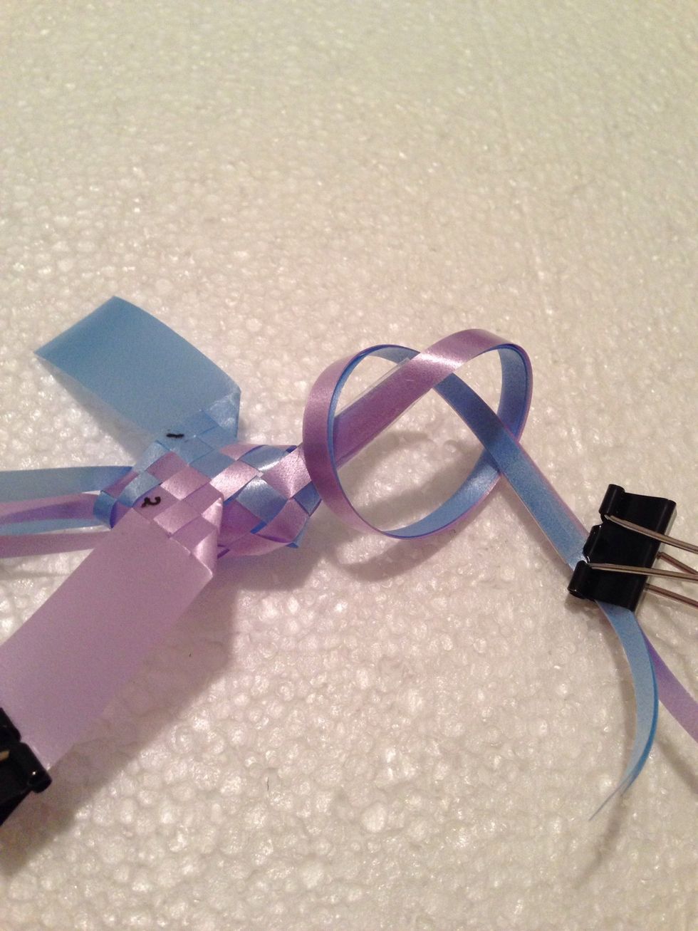 Forming the HEAD, gather all strips & knot.  Ends need to point downward, NOT up.