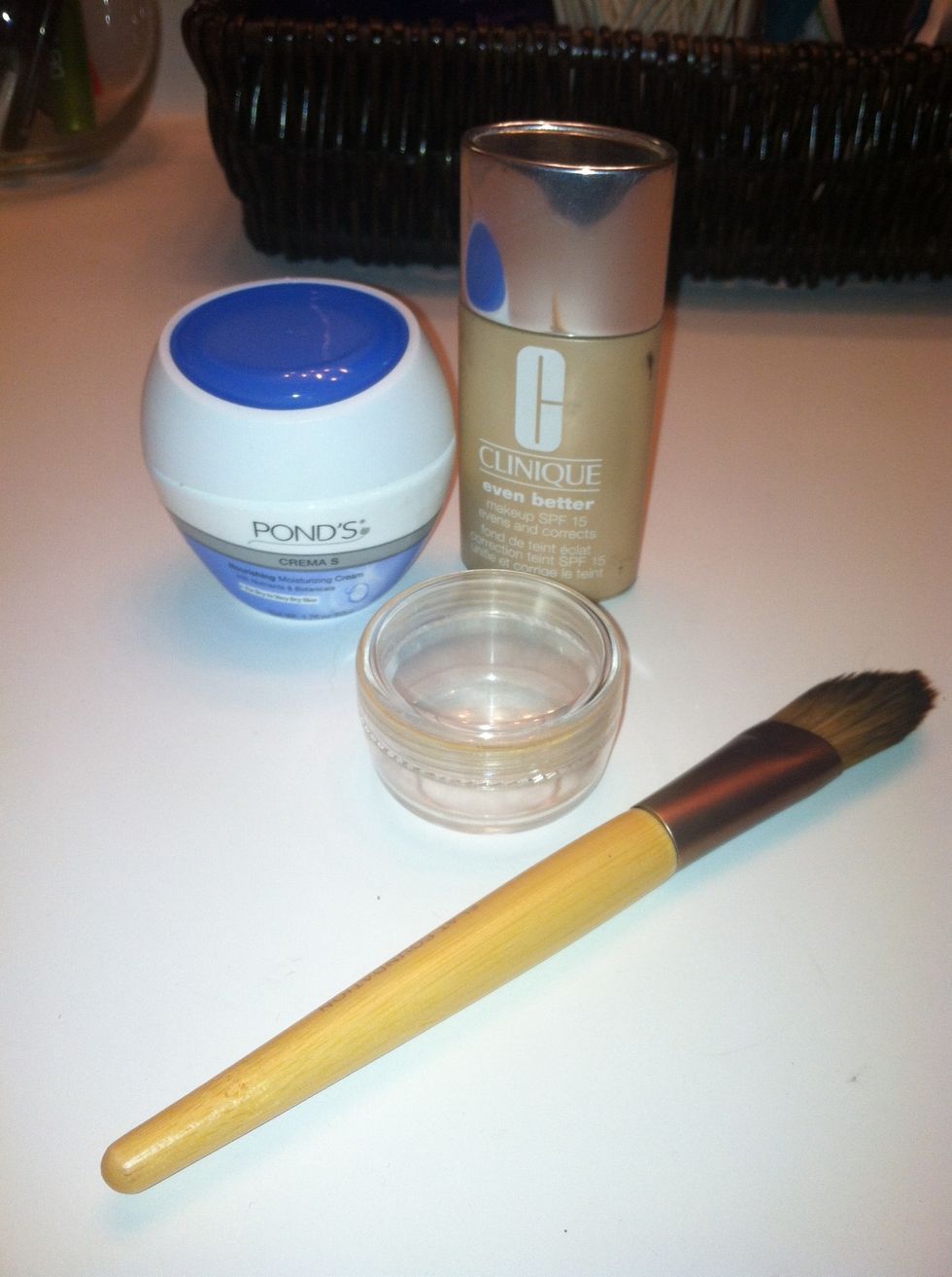 Foundation brush, favorite foundation, favorite face moisterizer and small container( mines from walmart in their travel size section, they have travel size containers)