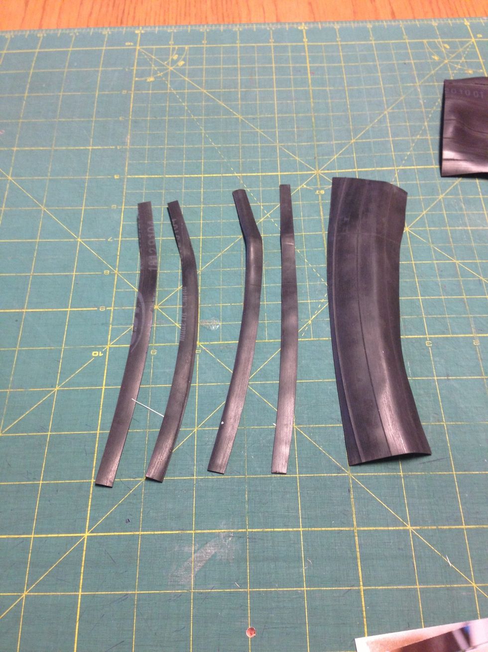 Four 8" x 1/4" strips of inner tube.