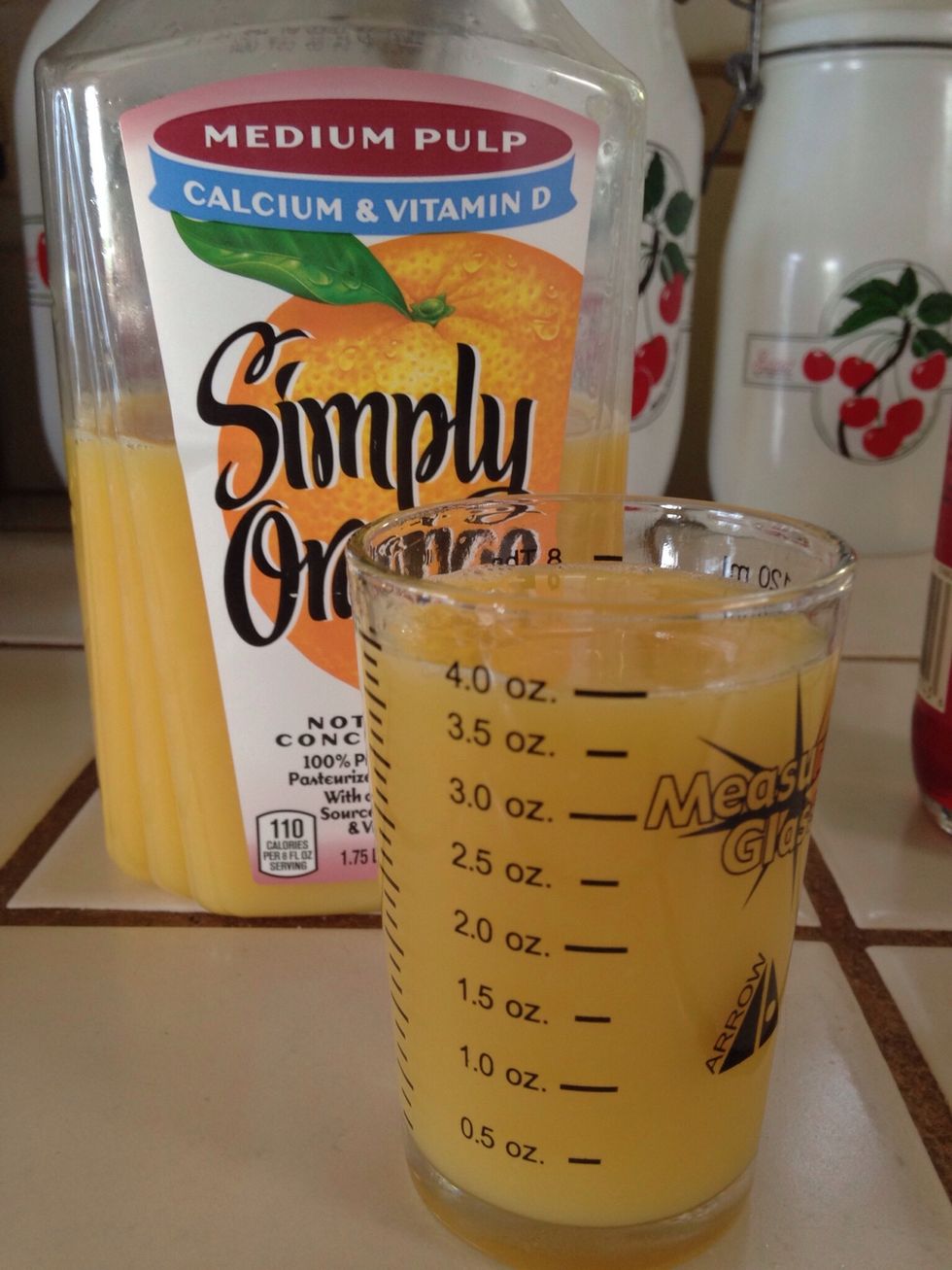 Four ounces orange juice