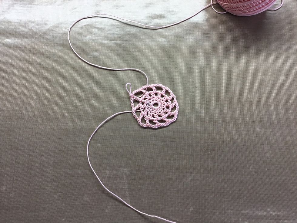 Fourth row: U.S. double crochet or a U.K. treble and three chain into each space around, join with a slip stitch.