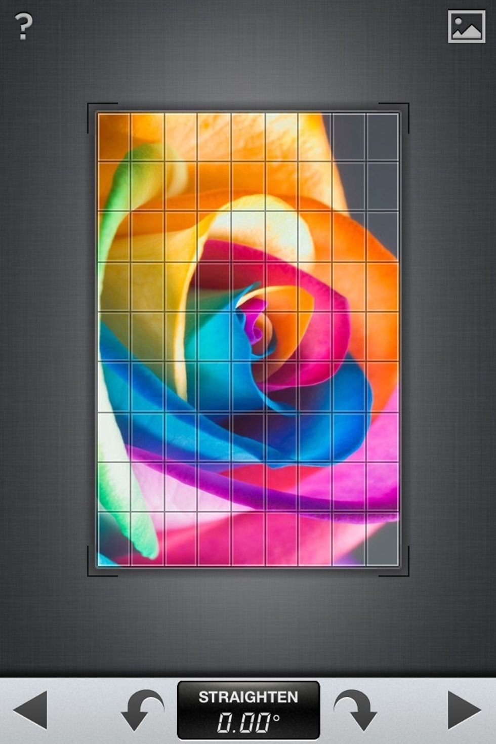 Fourth: Straighten. Press the arrows to rotate the photo. Alternatively, use two fingers to 'twist' it.