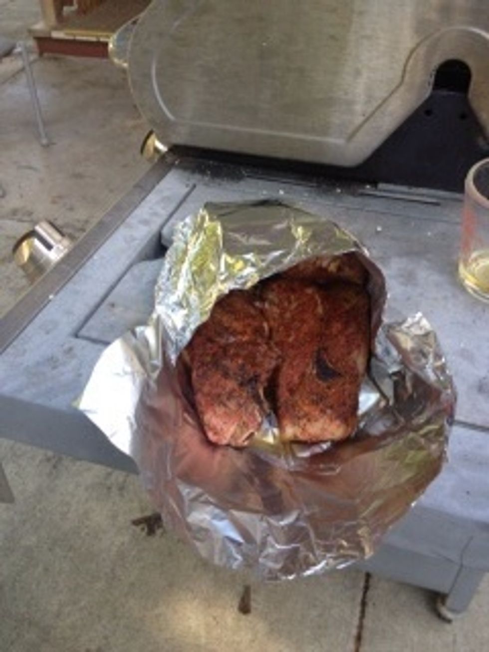 Fourth, take the meat and wrap it tightly in foil, before sealing it add about 1/2 a cup of apple juice the steam the meat till its tender.