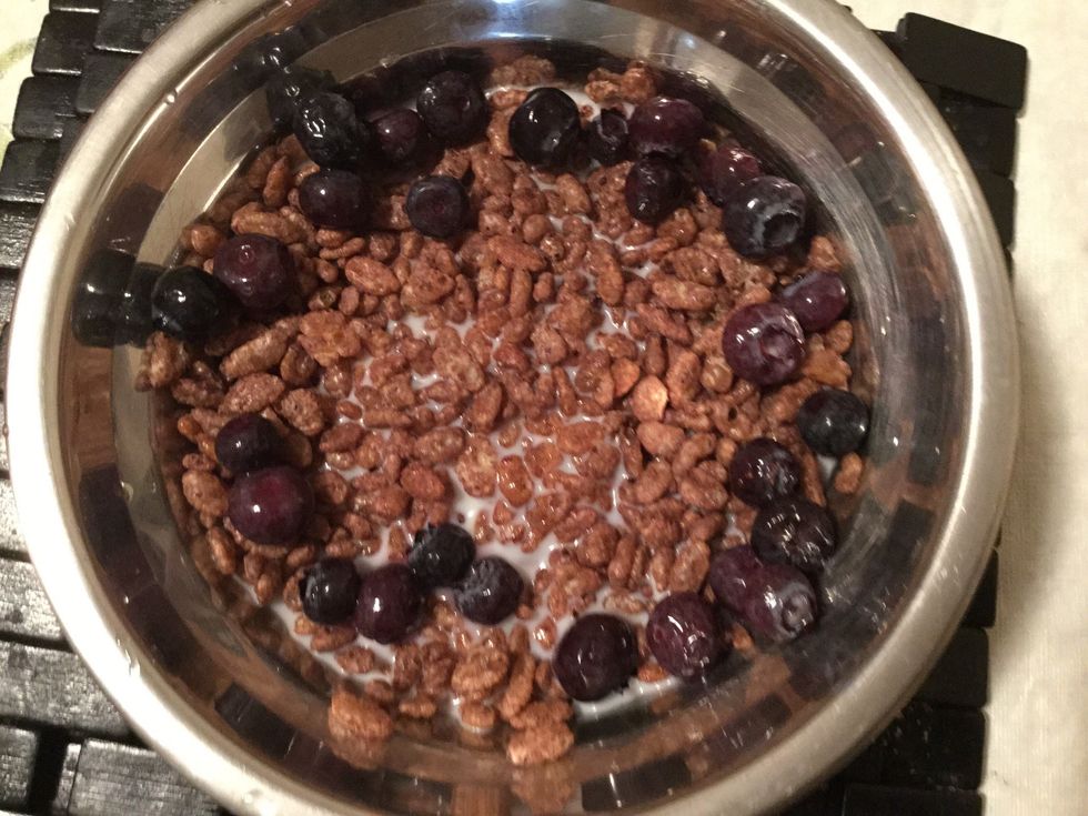 Fourthly, throw all the blue berries you have into the bowl.