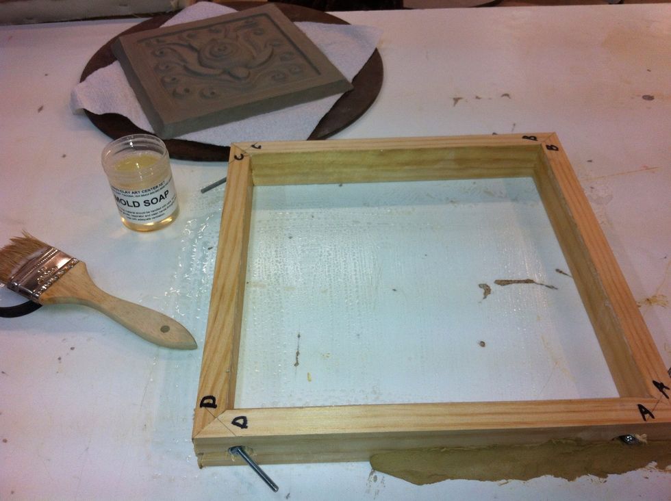 Frame on soaped melamine surface, seal outside edge with clay