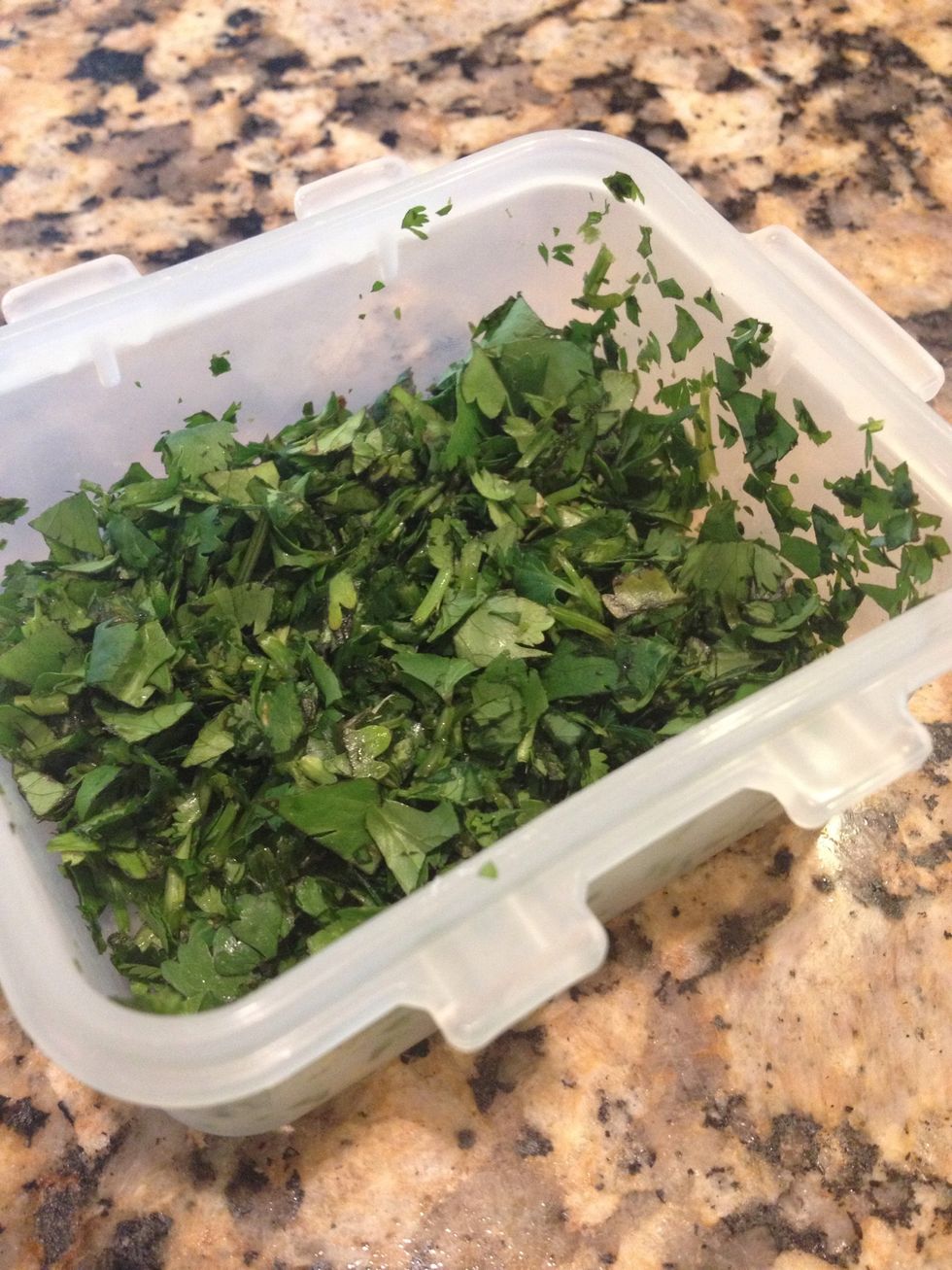 Fresh cilantro, I use about 2TB. Throw that Into dish and stir. Next, add about 3 cups chicken broth. (I use the ratio for every one c rice, 1 1/2 c broth)