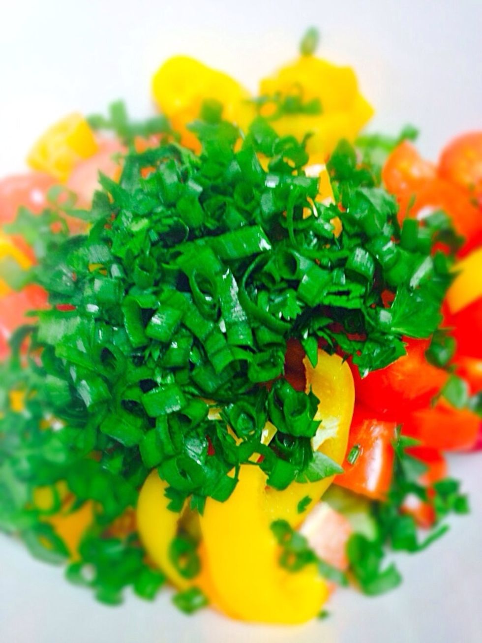 Fresh herbs. There is no parsley in original Greek salad and too bad because it adds so much flavor
