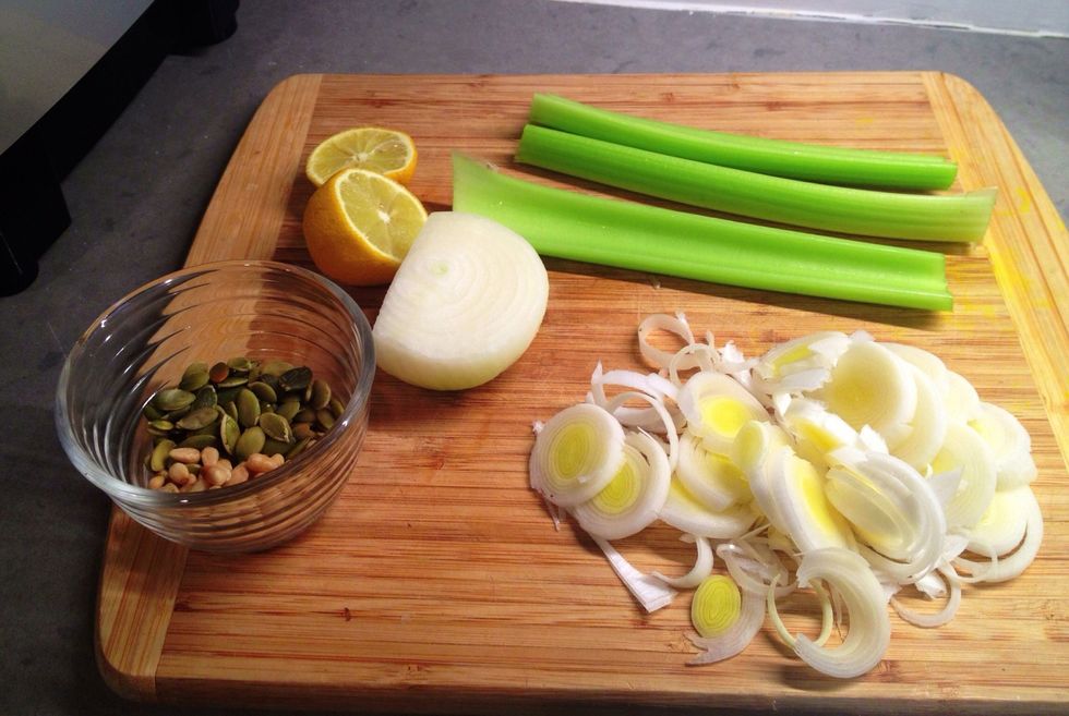Fresh ingredients: half an onion, the white part of 1 leek, stalks of celery. 1 lemon for juice and zest, and 1 Tablespoon each of raw pumpkin seeds and pine nuts