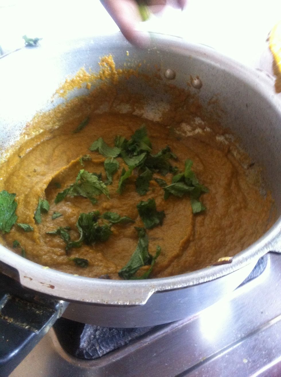 Fresh mint cleaned and if you want can chop them a bit and add it to the gravy...let it boil for some time on low flame...and this it the great time to get the mutton ready