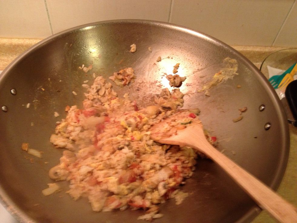 Fried egg along. when the fried egg is done, leave it away.  Fried those ingredients together  1. step put olive oil  2 step put garlic  3 step tomatoes  4 step mushrooms 5 step onion 6. Step rice