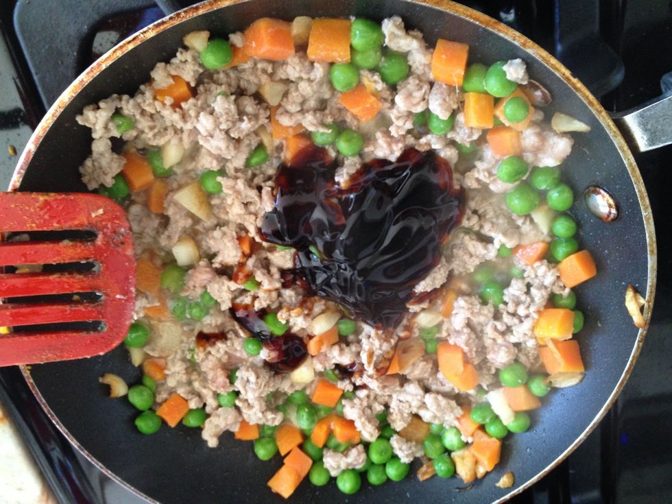 Fried garlic first then beans and carrot. Add ground meat in the last step with Oster sauce.