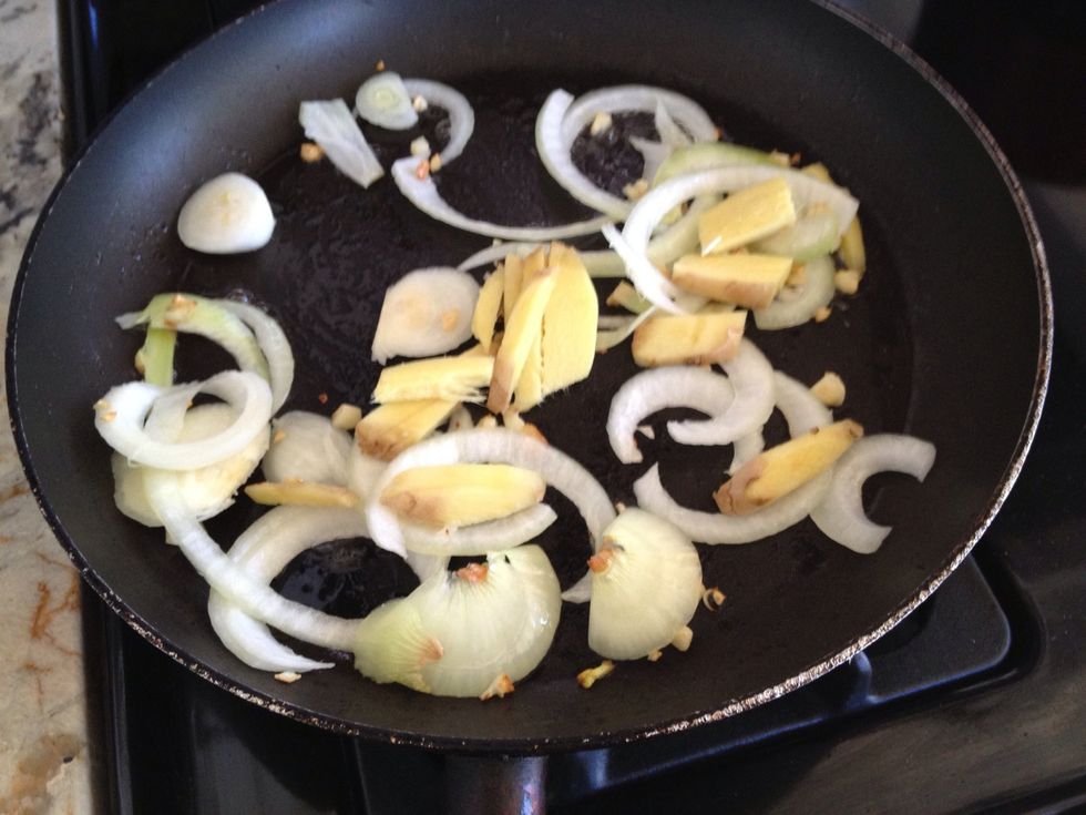 Fried garlic, onion and galangal then other veggie together.