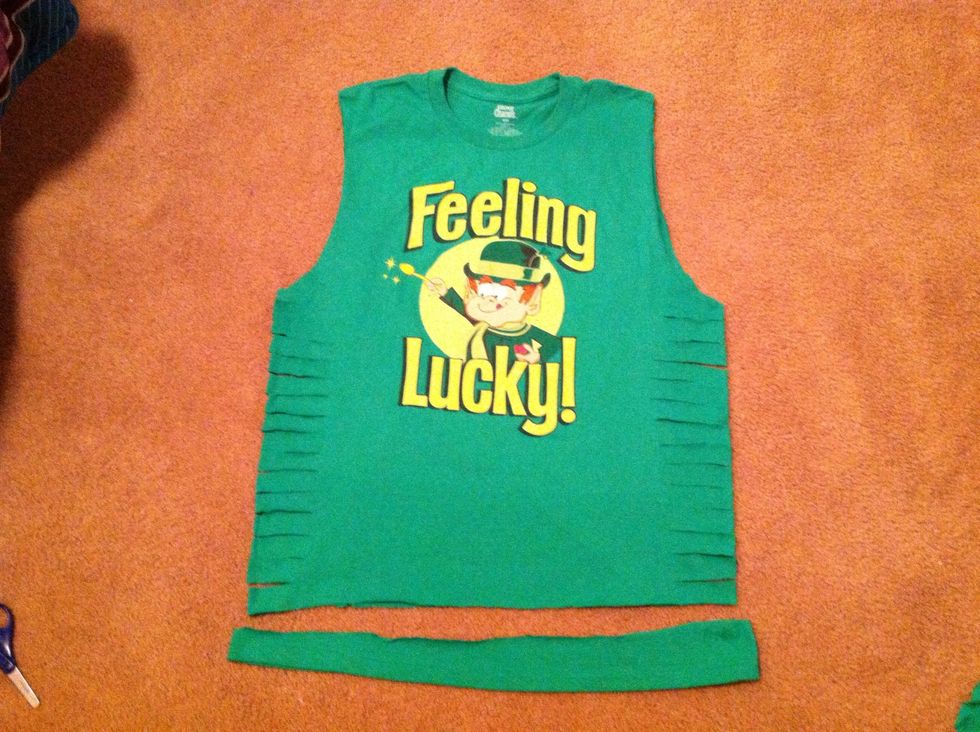 Fringe the sides by cutting them into about 1 inch strips, also cut off some of the bottom if it is long for you.