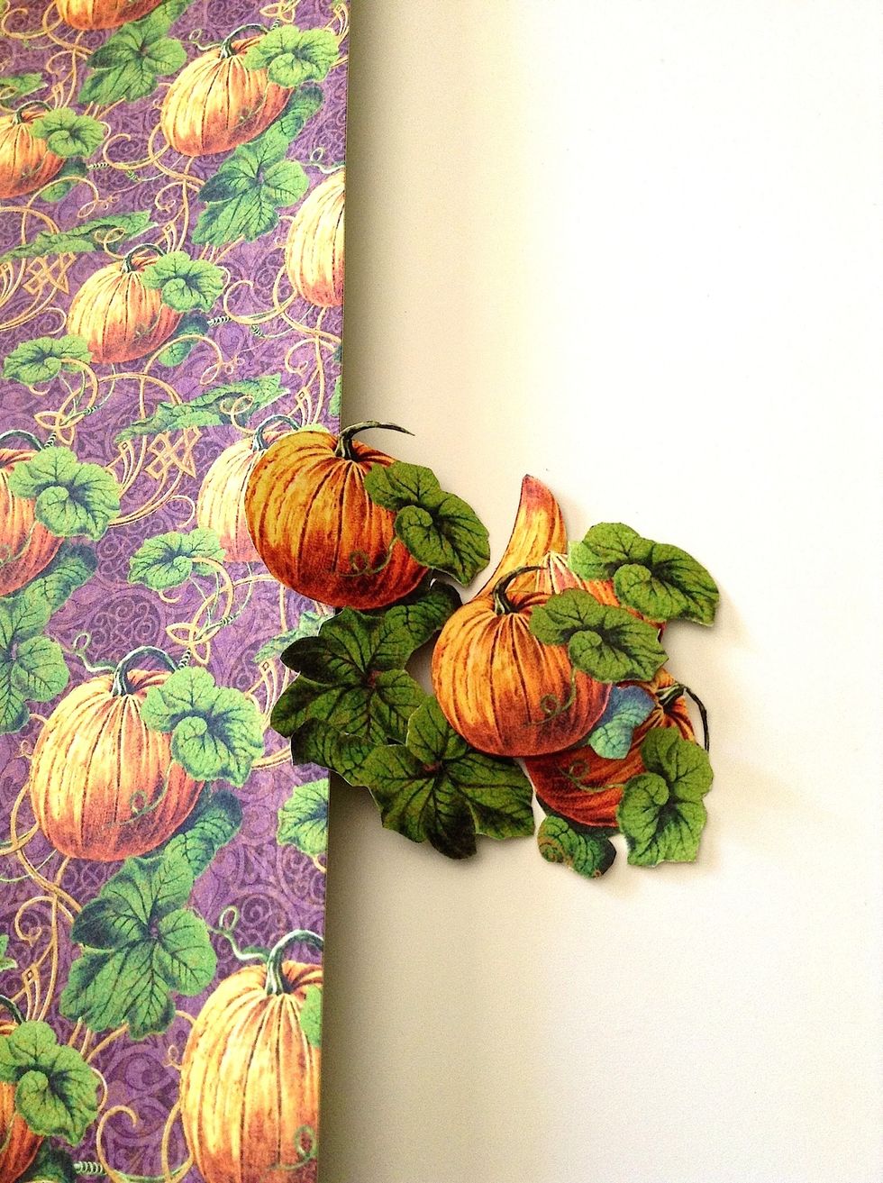 From An Eerie Tale papers, fussy cut some pumpkins images including leaves.