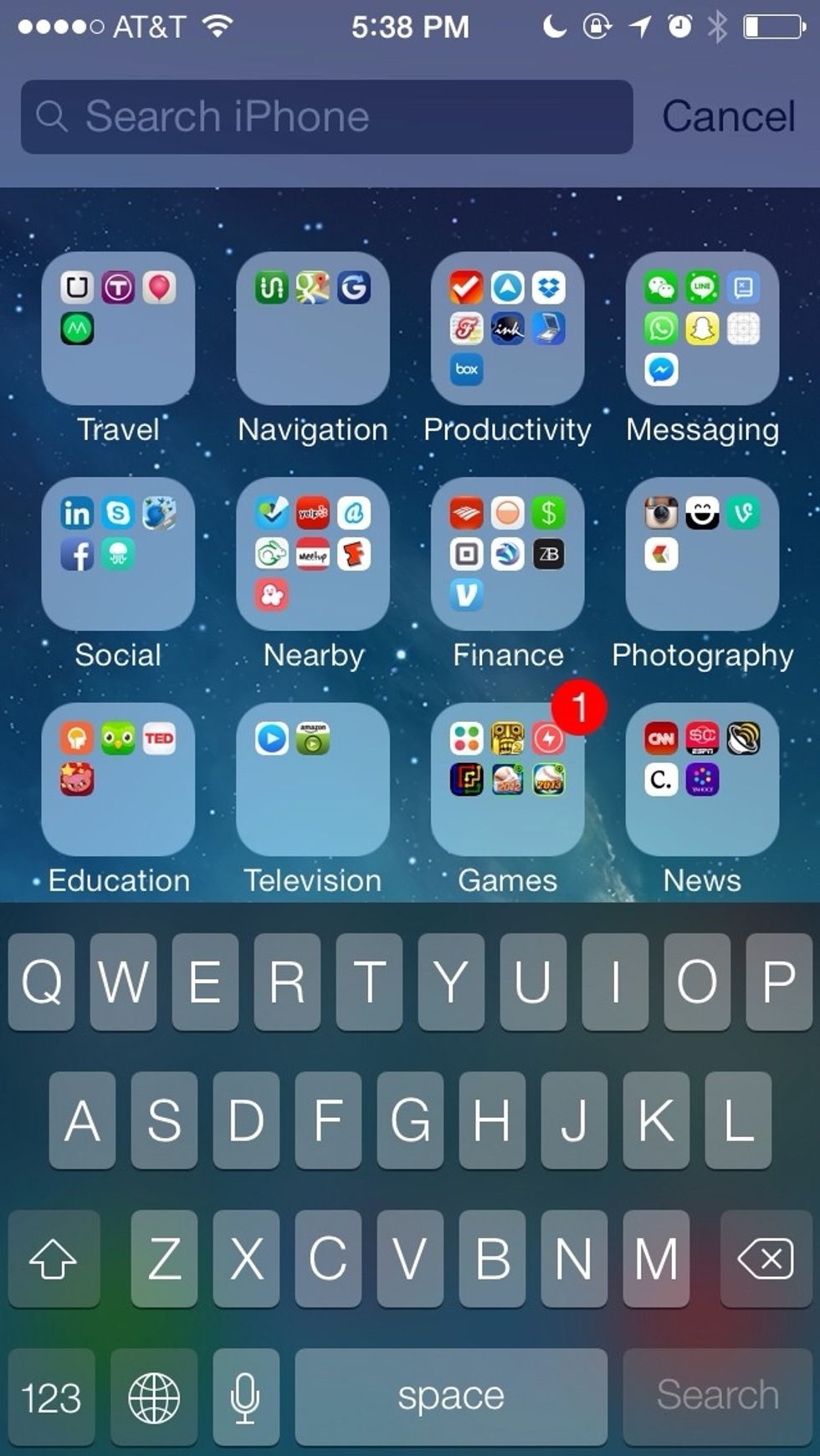 From anywhere on the home screen, swipe down to display the search bar.