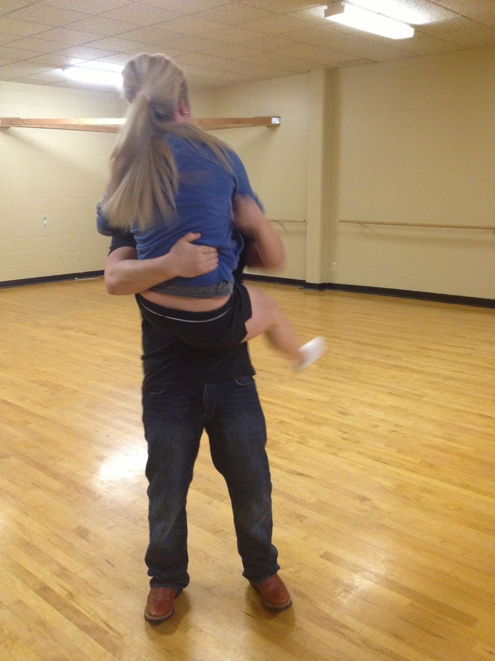 From here you can dip her like before. Her leg will fall off your shoulder and will end up in the cradle like at the very start.