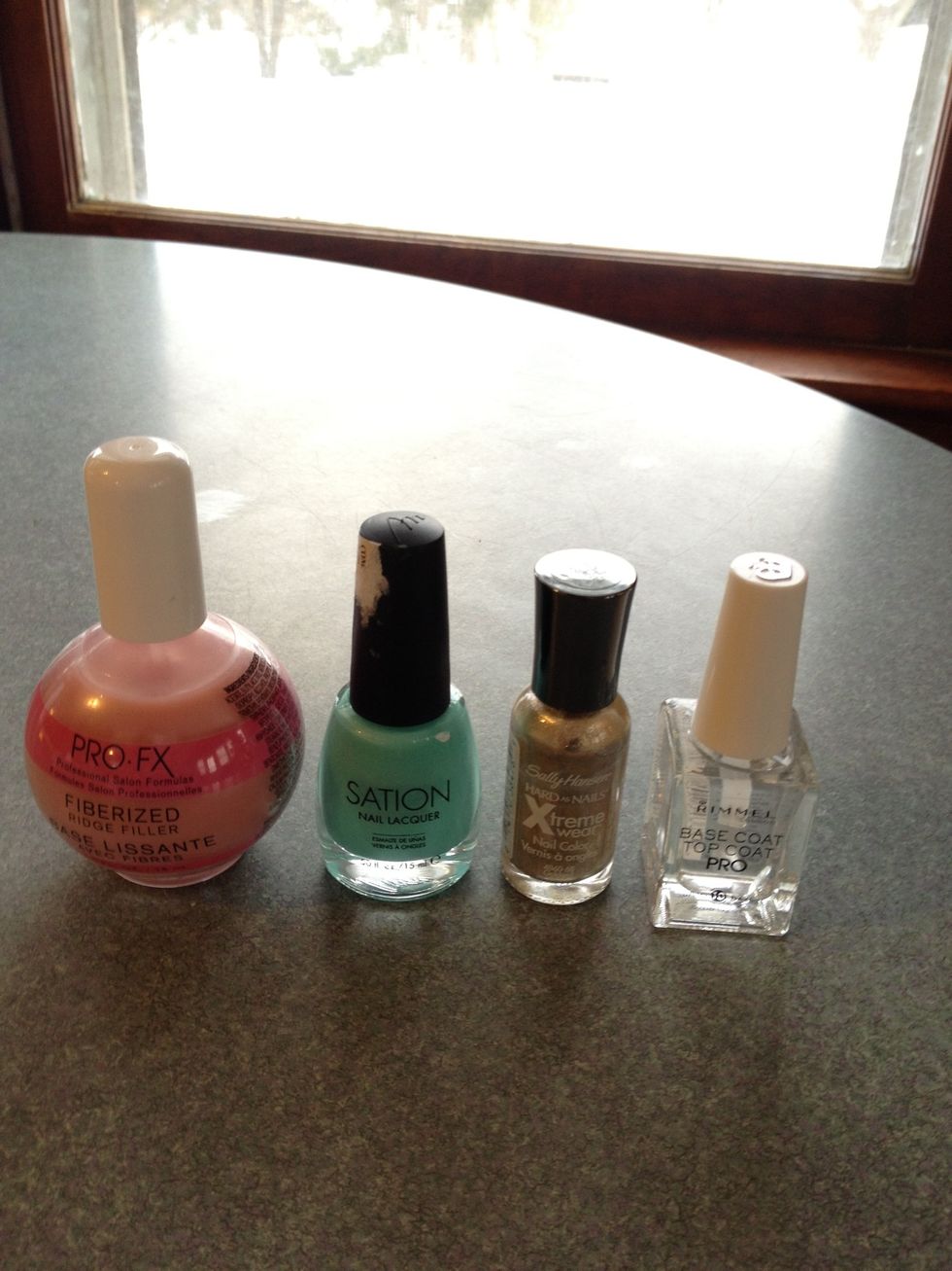 From left to right: 1.PRO-FX ridge filler. 2.Sation - "Holiday Golightly" 3.Sally Hansen Hard As Nails - Golden-I 4.Rimmel - Base Coat Top Coat Pro