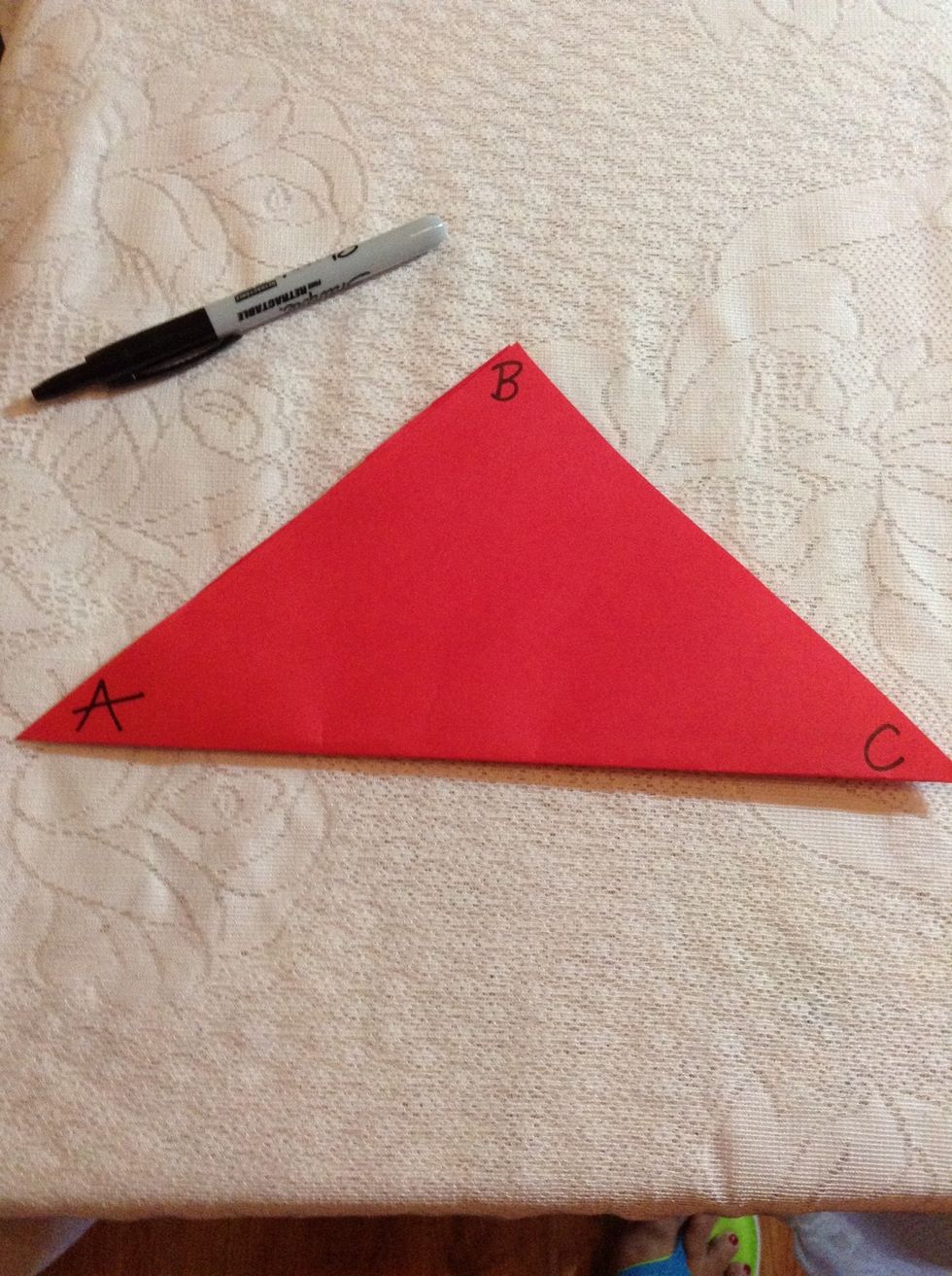 From left to right, label the corners of the triangle A, B, C.
