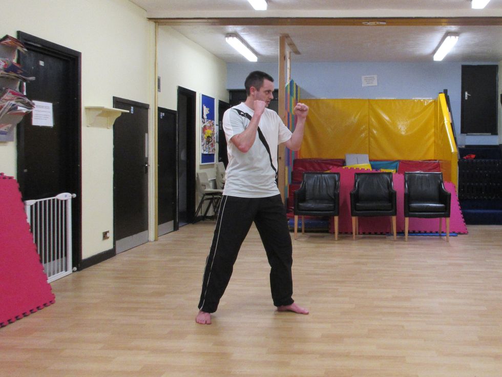 From my regular stance I prepare to turn round the back of myself.