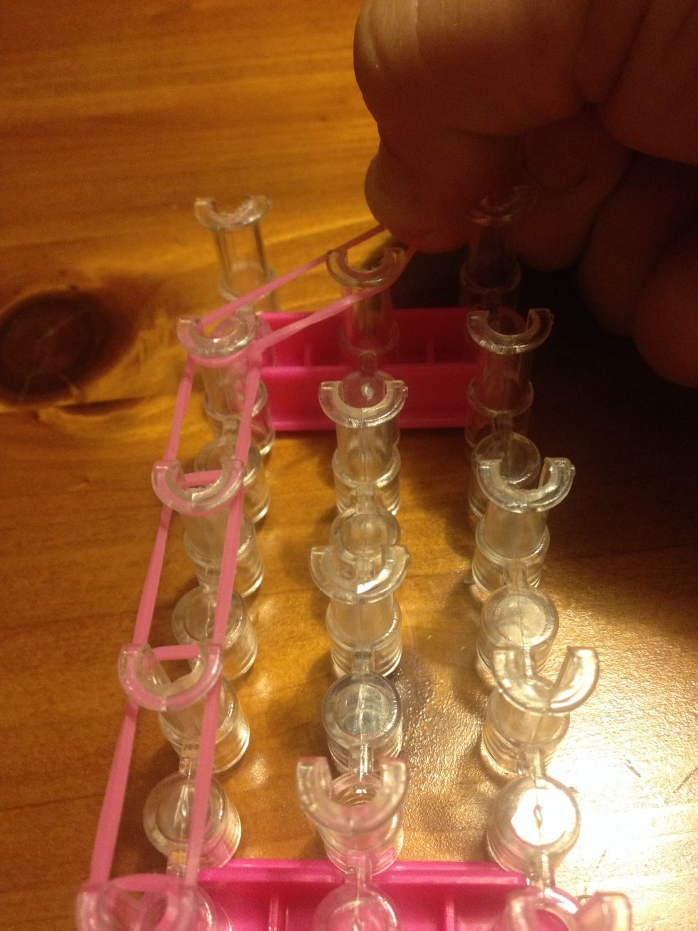 From second last pin loop the ban but take across to middle pin