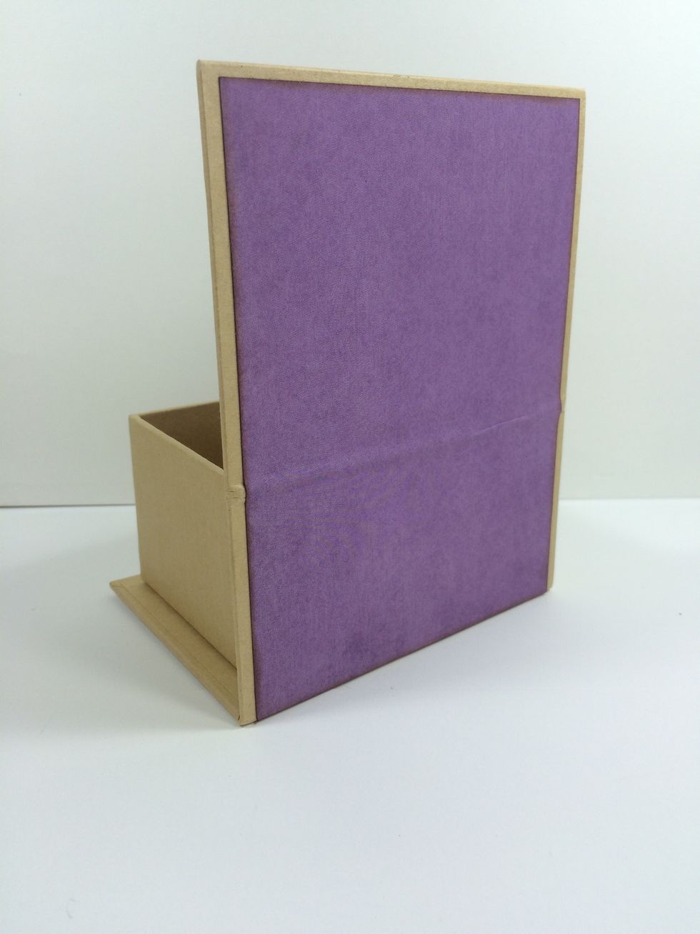 From some extra paper in the 6 x 6 pad, cut a 4 1/2" x 6" piece and adhere to the back side for a clean finish.