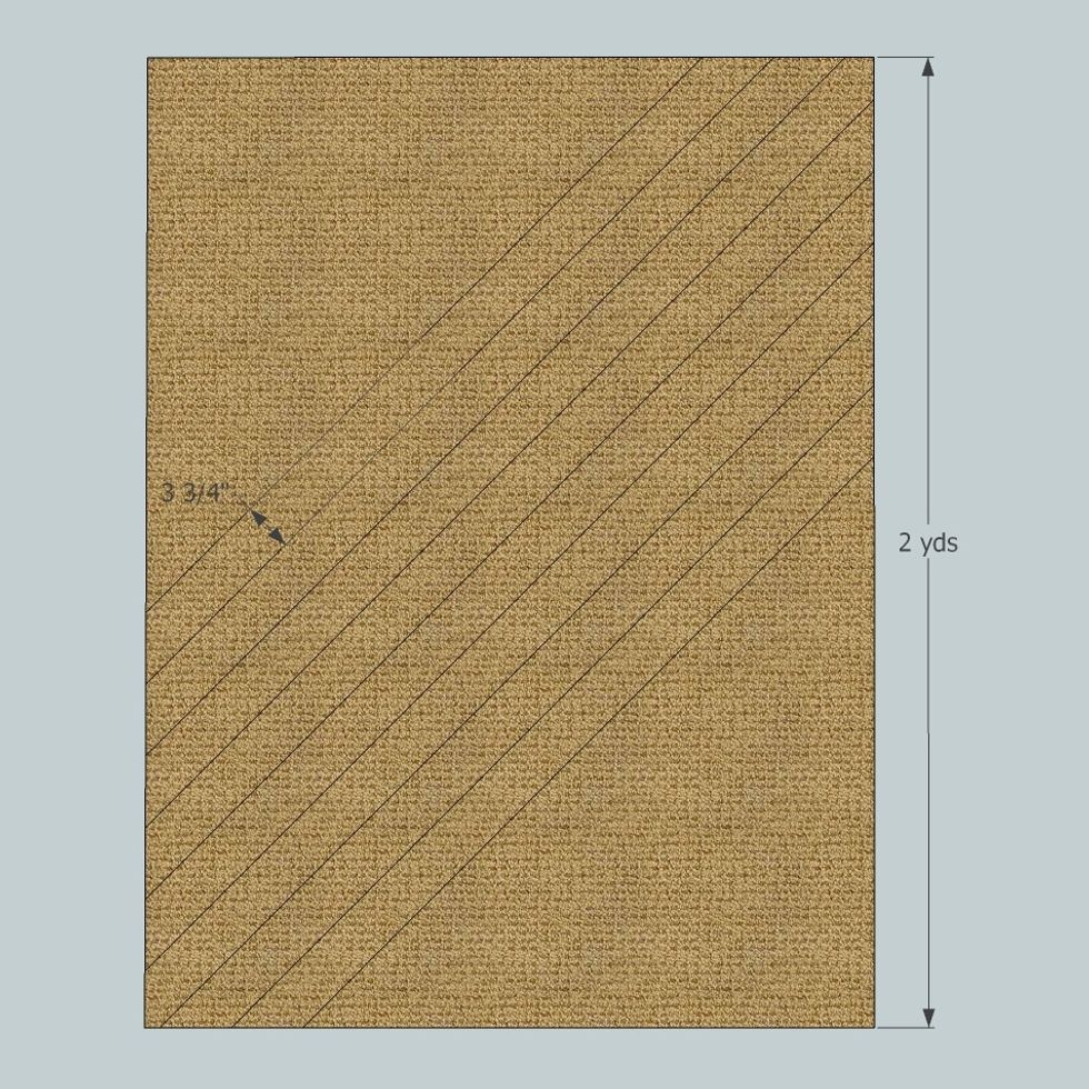 From the 2 yds of contrast fabric, cut (8) 3-3/4" bias strips.  For tips on cutting bias strips,  our tutorial at www.patemeadows.com/Cutting-Bias-Strips-for-Piping-and-Banding_ep_61.html