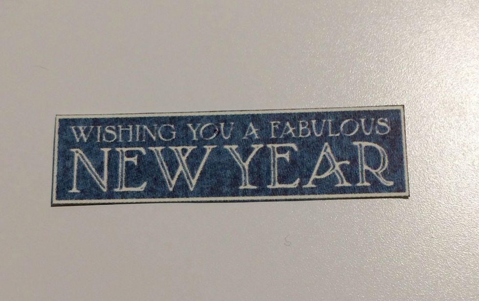 From the 8x8 January Collective paper, cut out the Wishing you a Fabulous New Year cut apart.