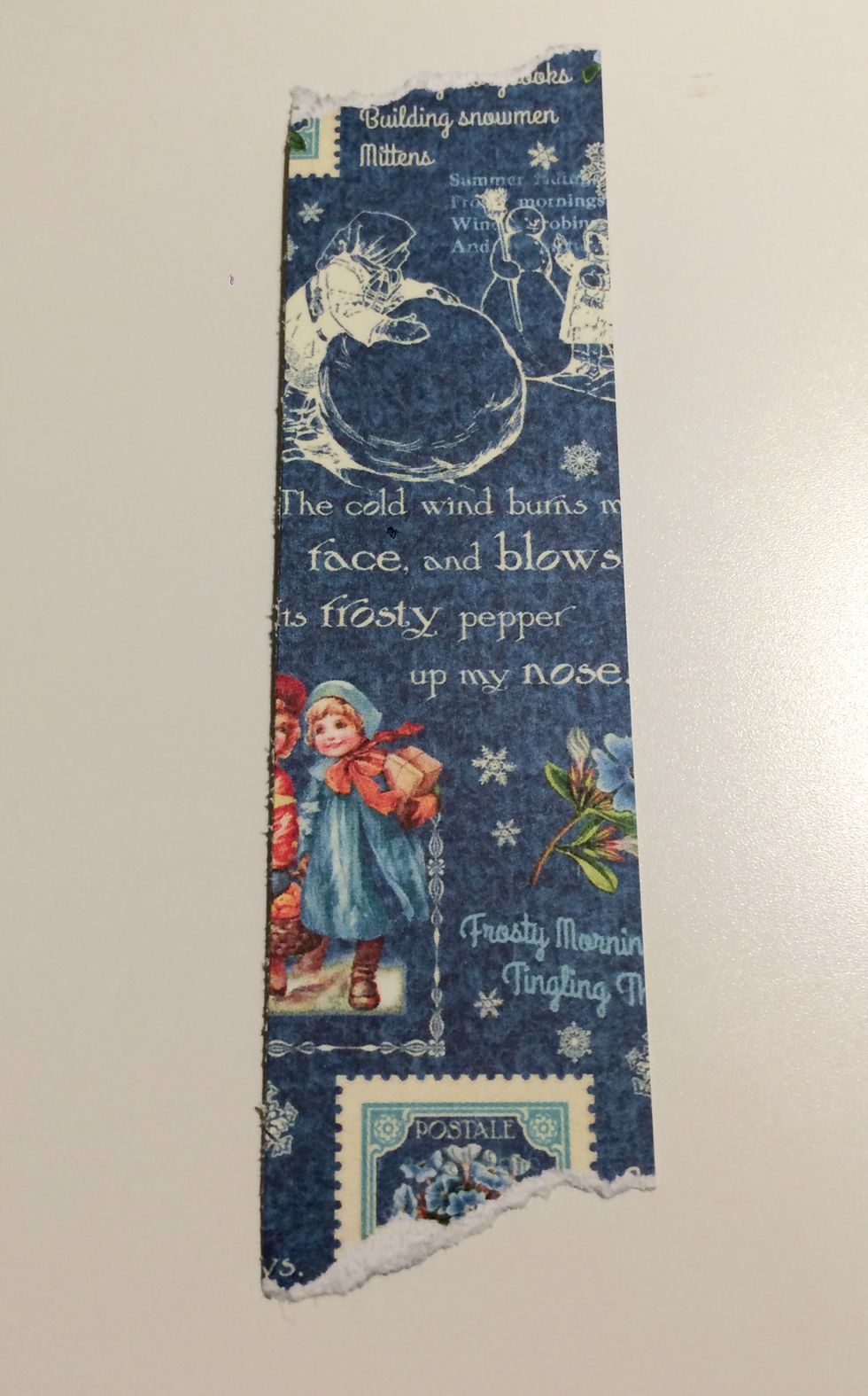 From the Children's Hour January Montage paper, cut a piece that measures 1 1/4" x 4 7/8". Tear a bit off the top and bottom of this paper.