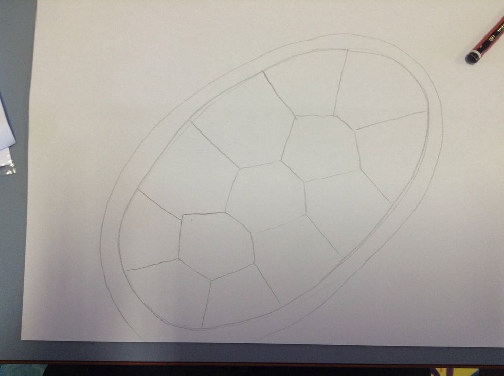 From the corner of each hexagon, draw a line to the edge of the inside oval.