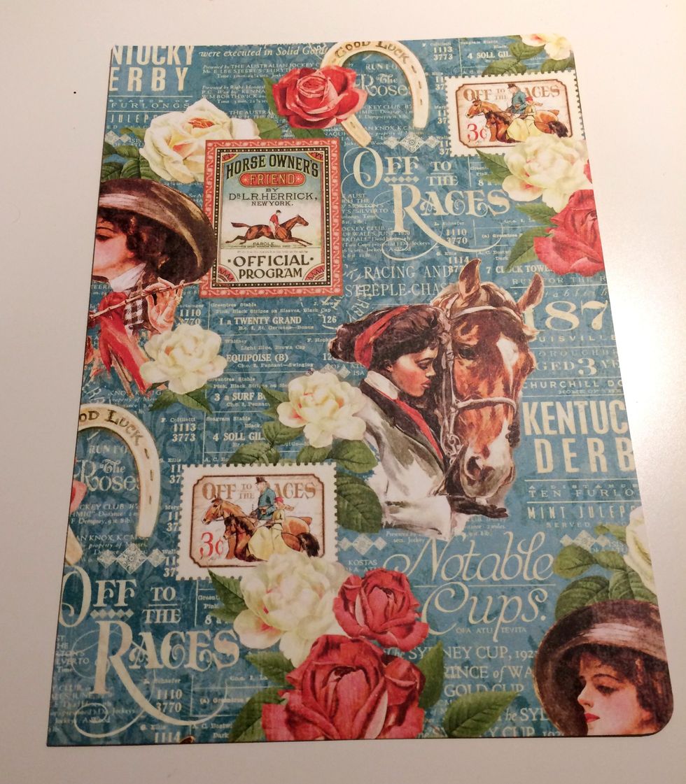 From the Elegance Running paper, cut a 6" x 8 3/8" piece. Round the corners on the top right and bottom right corners.