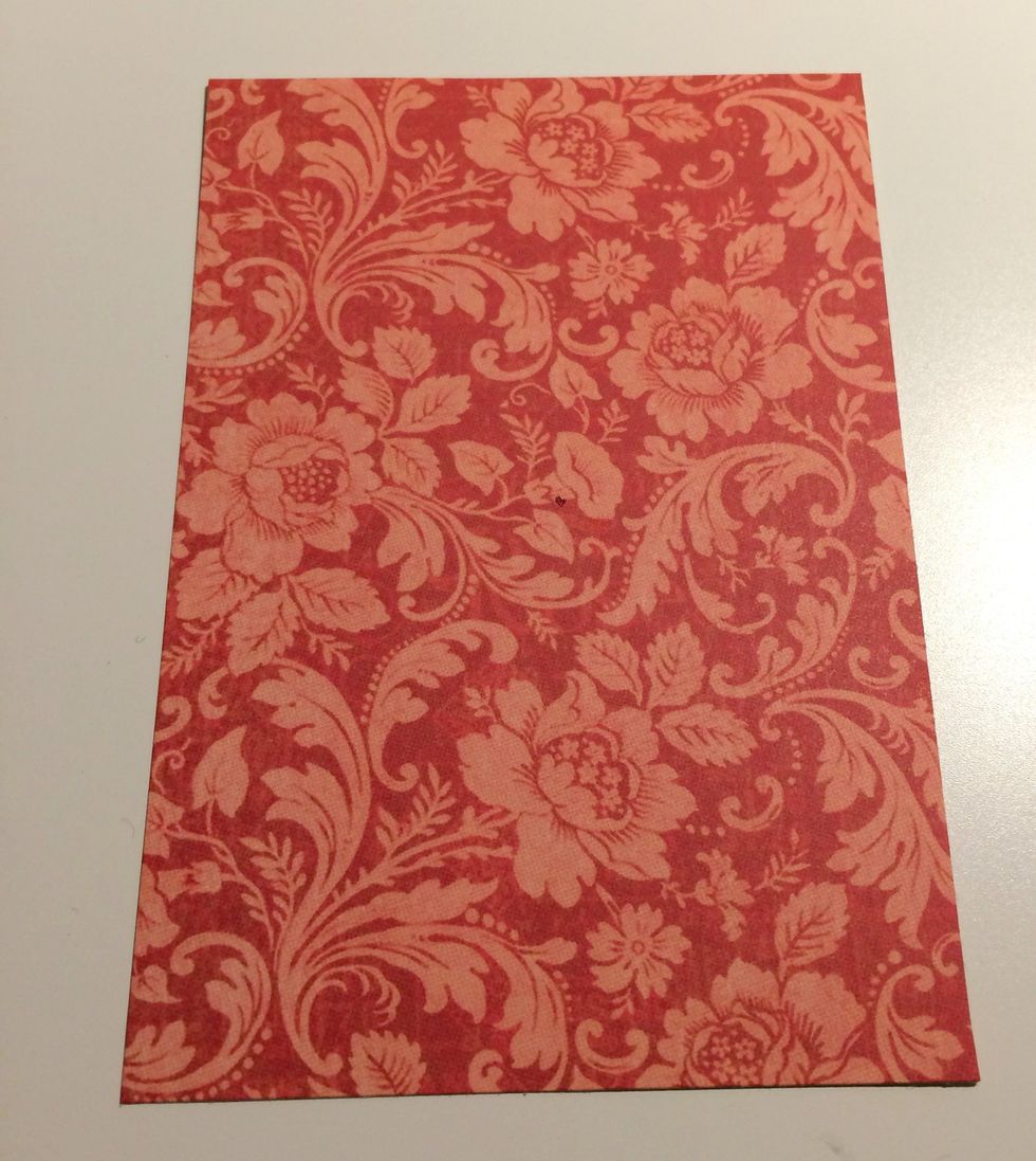 From the Elegance Running paper, cut a piece 3 5/8" x 5 1/4". You'll also need to cut a dark green piece of cardstock that's found in the patterns & solids, it will need to be cut to 3 7/8" x 5 1/2"