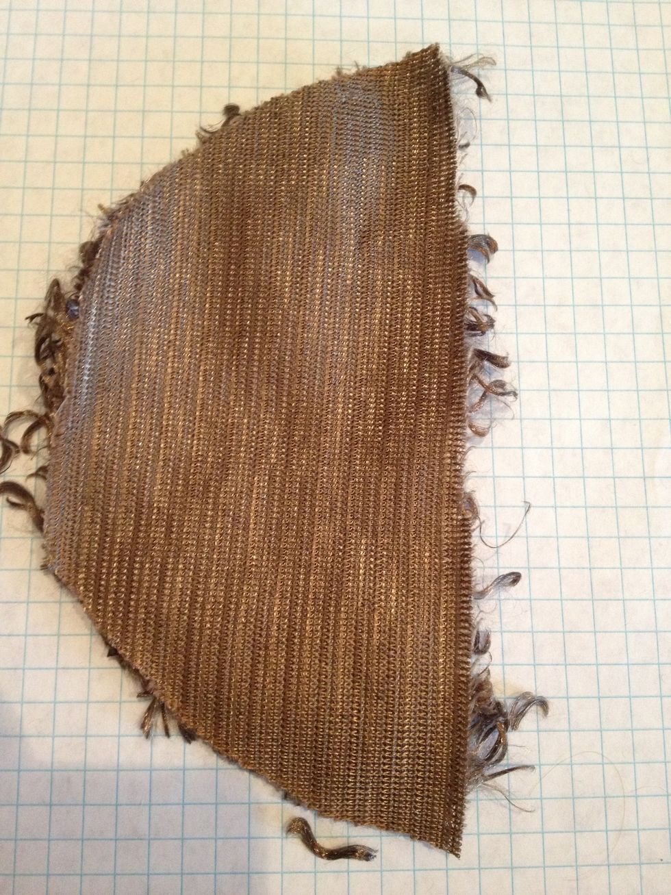 From the fabric you want for your body, cut TWO half moon shapes, about 1.5 ties the size of your head. My measurements: 6 1/4 (flat) x 3 1/4 (center)