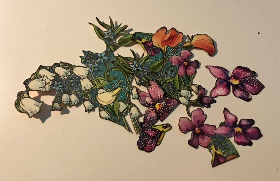 From the floral paper, cut which ever flowers you desire out. Ink the edges of the flowers using Photogenic Ink and a blending tool with foam.