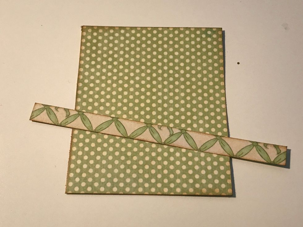 From the green lattice paper, cut a piece that measures 2 3/4" x 3 1/4". Cut a second piece that measures 3/8" x 4 1/2". Ink the edges of each piece using Vintage Photo Distress Ink & a blending tool.