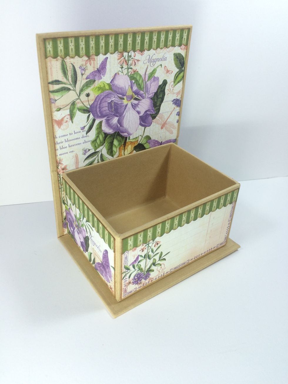 From the green stripe paper in the 6 x 6 pad, cut some 1/2" strips for your box. I used a small scallop scissor for a fancy edge. Adhere.
