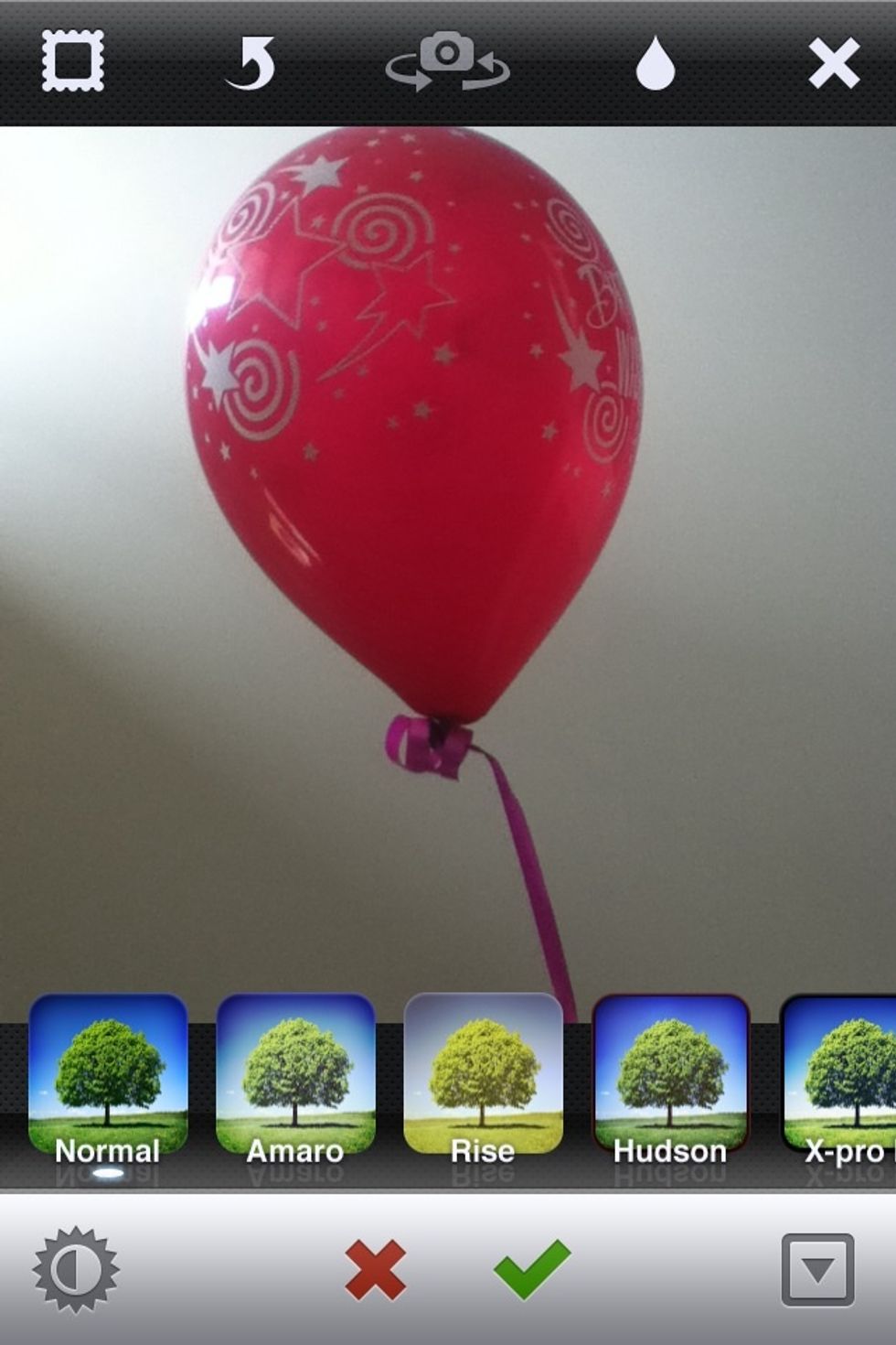 From the main screen click the Camara button and either a) take a pic or b) import one from your photo library( the 2 squares on top of each other)