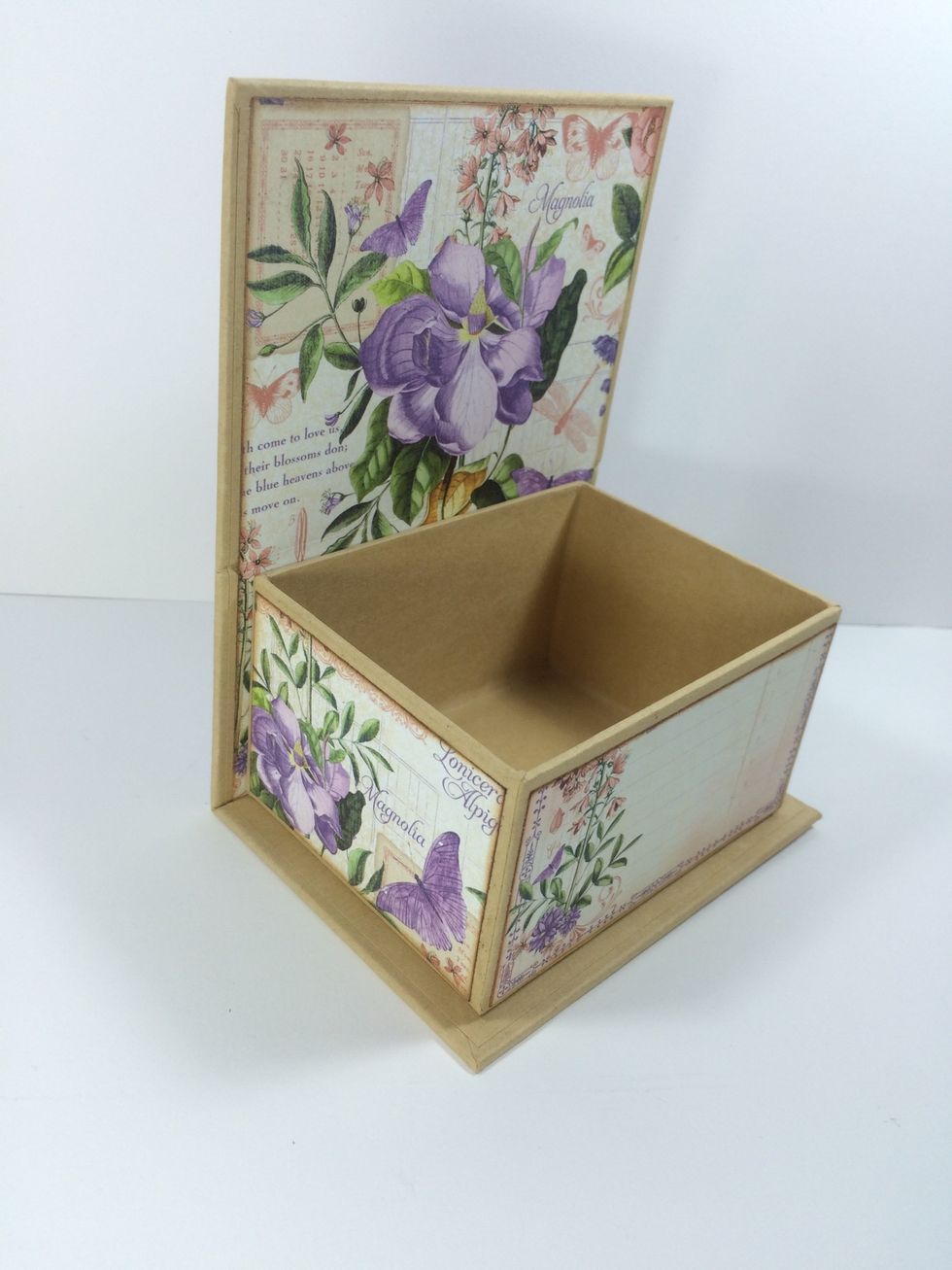 From the May Flourish page, cut two 3" x 2 1/8" pieces for the box's sides. Adhere. From the Cut-Aparts, cut a 4" x 2 1/8" piece (see Step 2) and adhere to box's front.