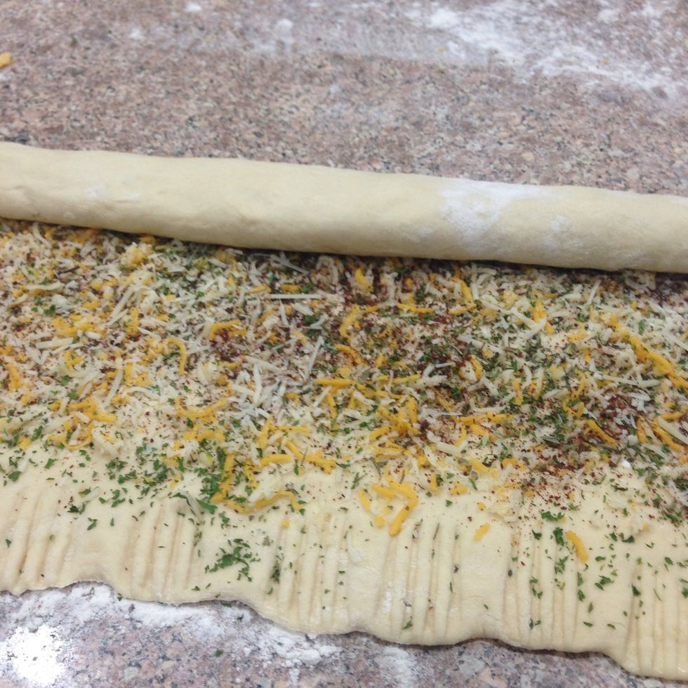 From the opposite end, roll evenly into a long.