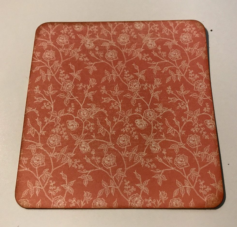 From the pink and cream floral paper, cut a piece that measures 4 1/4" x 4". Round the corners. Ink the edges of the paper using Vintage Photo Distress Ink and a Blending Tool with foam.