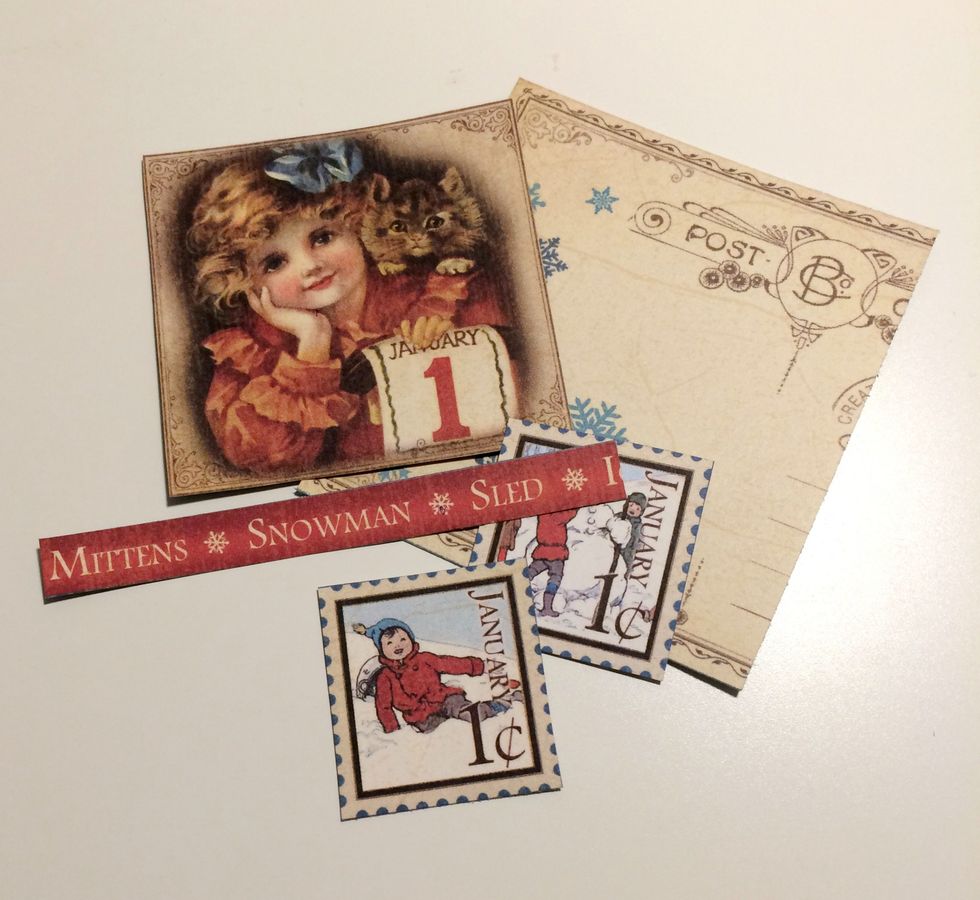 From the Place in Time - January Cut Aparts, cut out two stamps, the postcard, the girl with Jan.1 and the Mittens border. Cut the postcard to 3". Cut the border to 3 5/8".