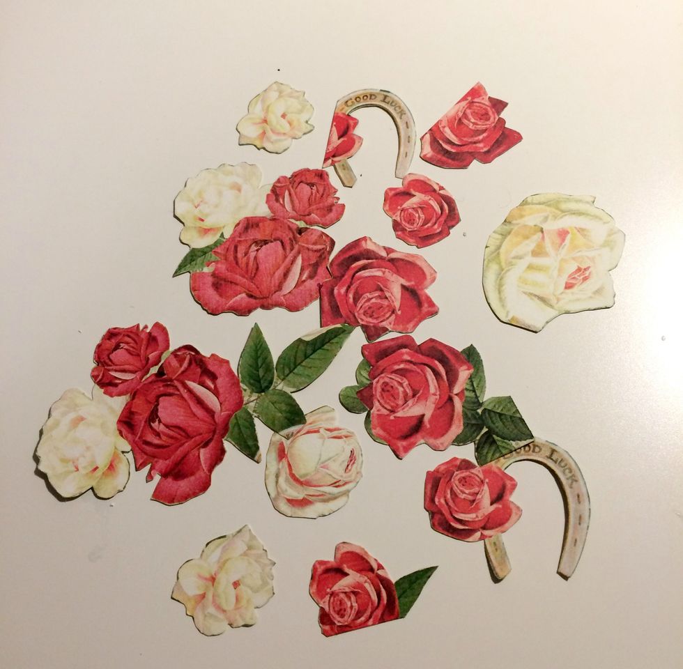 From the Run for Roses paper, fussy cut 2 small white roses, 2 small red roses, 2 set of three roses with leaves, 1 single rose with leaves, 2 roses with horseshoes, 3 white roses and 2 single roses.